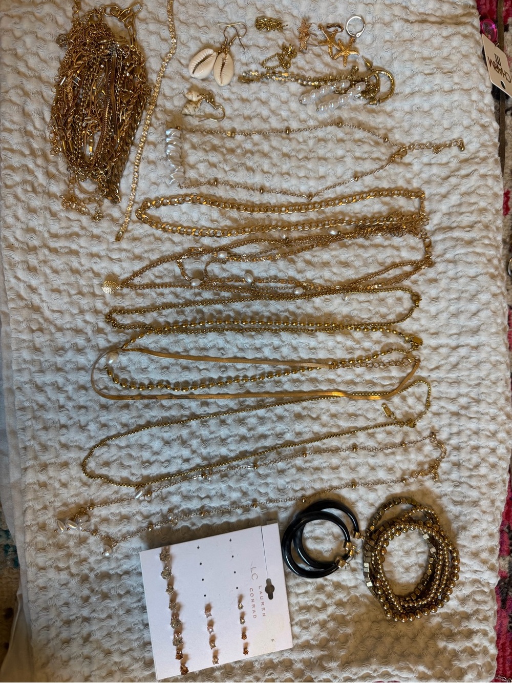 Lot of Gold Tone Jewelry, bracelets, necklaces and earrings